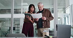 Business people, tablet or documents in office for discussion, timesheet verification or HR admin. Mature man, woman and conversation in meeting with tech, paperwork and review for management report.