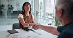 Business woman, handshake and documents in meeting with deal, welcome and financial results. Mature person, shaking hands and smile with graphs, paperwork or advice with charts at investment agency