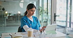 Tablet, woman and nurse in hospital for medical research, treatment or diagnosis planning. Digital technology, nursing and female healthcare worker with documents for recording patient information.