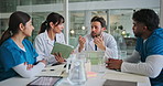 Doctors, nurses and tablet in hospital together for collaboration, meeting or training review. App, conversation and feedback with healthcare team in clinic for medical development or education
