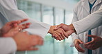 Meeting, doctors and welcome with handshake in hospital for onboarding, new recruit or introduction. Medical staff, people or shaking hands for healthcare opportunity, internship success and applause