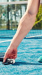 Athlete, hands and tie shoes on padel court for outdoor match or workout preparation. Closeup, person and training or getting ready with sneakers, laces and sport for game, fitness or challenge