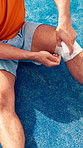 Hands, person and bandage leg of padel tennis from sports injury, fitness mistake and first aid. Above, man and wrap gauze on wound from game accident, blister prevention and sprain treatment outdoor