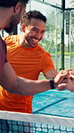 Padel, sports and people fist bump on court for teamwork, support and goodluck for playing game outdoor. Fitness, challenge and men with gesture for competition, exercise and training for tennis