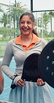 Girl, talk and laugh at tennis court for padel, game and start with training routine for fitness. People, women and men with team, racket or equipment with conversation for funny story with sports