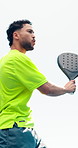 Fitness, low angle and man on tennis court with swing, practice and exercise in training match. Padel, below and athlete outdoor with racket, game endurance and ball control in sports hobby.