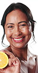 Happy woman, face and lemon with vitamin C in studio for detox on a white background. Portrait, female person or model with smile, natural organic fruit or fiber for collagen, beauty or citric acid