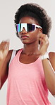 Runner, stretching and sunglasses with black woman in studio for health, fitness and muscle. Cardio challenge, athlete and training with person on white background for wellness, warm up and workout
