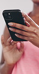 Hands, fitness and woman in studio, smartphone and typing with social media on white background. Closeup, internet or healthy person with connection, network and message to contact or online chatting