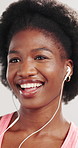 Happy, athlete and woman with earphones, studio and listening to music with subscription for workout. White background, streaming and black person with tech for entertainment, audio and fitness break