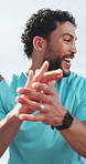 Fitness team, excited man and clap in celebration of marathon winner, motivation and fist pump. Exercise, happy group and applause for success, goal achievement and cheering for champion outdoor