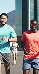 Running, fitness and men in city, support and training with challenge, exercise and wellness. People, runners and athlete in street, competitive and endurance with practice, cardio and marathon