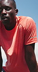 Below, tired and black man with fitness, outdoor and exercise with fatigue, breathing and wellness. Challenge, African person and athlete in city, exhausted and burnout with rest, workout and break