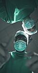 Face, surgery team and doctors with POV for medical help, flare or emergency treatment with tools. Operation, surgeon and healthcare procedure below, life saving or people with mask in clinic theater