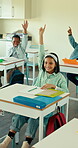 Education, answer and lesson with children in classroom for learning, knowledge and growth. Arms raised, student development and study with kids in school for academy, future and scholarship