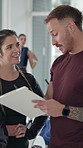 Woman, man and clipboard for sign up at gym, talk and explain offer with smile at fitness club. People, document and client with welcome for membership, subscription or contract at wellness class