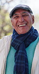 Happy, nature and face of senior man with laughing for comic, comedy or joke at home backyard. Smile, confident and portrait of elderly male person with pride for retirement in garden in Mexico.