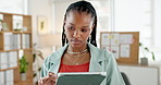 Black woman, tablet and scroll at startup for project, review and checklist with research at media company. African person, tech and click with app, insight or solution for article at creative agency