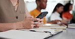 Hands, book and phone with coworking at startup, texting contact and notes in office at media company. Person, smartphone and mobile app for notification, feedback and project at creative agency
