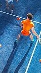 Padel racket, coach or men with ball on court, outdoor sport and training lesson for skills development. Above, instructor and athlete swing tennis gear for coordination, fitness or private practice