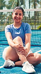 Fitness, face and Indian woman on tennis court with smile, pride and confidence in padel training. Happiness, portrait and athlete outdoor in sportswear, exercise goal and workout in body sport.