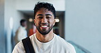Face, student and man with smile, college and happy to learn with scholarship, education and hallway. Learner, laughing and people with funding opportunity for university, knowledge or academic grant