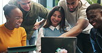 Team, laugh and group with laptop, meeting and reading positive reviews on social media in newsroom. Creative, journalists and happy for viral documentary, pointing and performance review on website