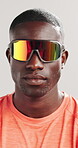 Runner, sunglasses and face of black man in studio for health, fitness and confidence. Cardio challenge, sports athlete and training with person on white background for wellness, pride and workout