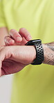 Man, hands or smart watch in studio for workout, tracking heart rate or fitness progress app. Person, scroll or check time for exercise results, wellness and monitor step counter on white background.