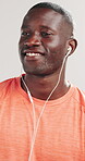 Happy, athlete and man with earphones, studio and listening to music with subscription for exercise. White background, streaming and black person with tech for entertainment, audio and fitness break