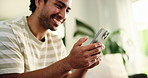 Happy, sofa and man with phone scroll in home for social media, online chatting and internet on weekend. House, living room and person on smartphone for mobile app, connection and website on couch