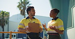 People, talk and clipboard for courier outdoor for planning, stock survey and logistics. Team, explain and checklist for quality assurance, delivery schedule and supply chain for shipping information