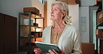 Logistics, tablet and thinking with business woman at work for overnight delivery or distribution. App, boxes and planning with mature employee in dark office at night for communication or shipping