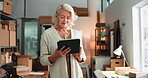 Logistics, schedule and tablet with business woman in office for delivery or distribution planning. App, boxes and ecommerce with mature employee in workplace for communication or shipping of order