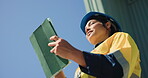 Tablet, inspection or manager with helmet to check compliance, monitor workplace or safety practice. Site review, logistics audit or woman with risk assessment, protection standard or tech from below