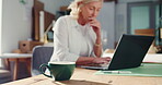 Coffee, ecommerce and laptop with woman in warehouse for delivery confirmation, inventory and research. Shipping checklist, online order and courier distribution with mature person and tea cup