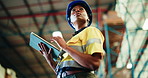 Black woman, tablet and warehouse inspection with scroll, thinking and stock with low angle for logistics. Person, tech and review with app for inventory management, shipping or supply chain at plant