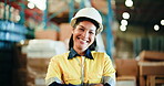 Logistics, face and woman in warehouse with laugh, smile and confidence for export distribution. Inventory management, portrait and bokeh in factory for quality control, shipping and arms crossed