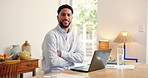Face, remote work and happy man with laptop in home office, confidence or financial advisor. Portrait, smile and freelance consultant with computer for investment, arms crossed and pride in Oman