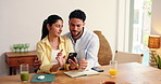 Home, smartphone and couple with love, conversation and bonding together with social media. Happy, man and woman with cellphone, internet and connection with relationship, app and online chatting