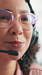 Glasses, headset and woman speaking in contact center, customer care and troubleshooting. Tech reflection, helpline and virtual assistant consulting with client for online support, mic and advice