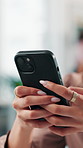 Smartphone, hands and businesswoman in office with networking, communication or contact. Technology, typing and creative editor with cellphone for texting or chatting on mobile app in workplace.