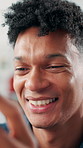 Phone, smile and businessman in office with networking, communication or contact with email. Technology, happy and creative editor with cellphone for texting or chatting on mobile app in workplace.