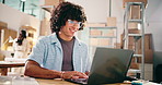 Warehouse, entrepreneur or man typing with laptop for ecommerce, reading order review or product feedback. Pc, customer engagement or people coworking for online promotion, supply chain or handheld