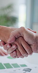 People, handshake and networking in office for business deal, investment and statistics review. Shaking hands, team and paperwork in workplace with graphs, b2b development and project collaboration.