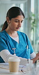 Woman, nurse and tablet in office at clinic for report, administration and medical review. Person, healthcare professional and tech with application, documents or contact with telehealth at hospital