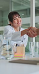 Happy woman, doctor and meeting with handshake for teamwork or success together in hospital. Female person, healthcare worker or employee shaking hands with smile or applause for medical partnership