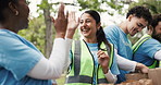 Excited, women and high five for volunteer project, park or community service with food distribution. Outdoor, grocery and people with social responsibility, celebration and collaboration for charity