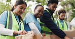 Packing, food drive and volunteers with packets outdoor for nonprofit, charity or community outreach. Groceries, help and group of people with parcels for donation with social responsibility in park.