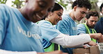 NGO, food drive and volunteers with boxes outdoor for nonprofit, charity or community outreach. Groceries, helping and group of people with parcels for donation with social responsibility in park.